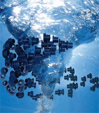 Cojinetes de deslizamiento de polímero libres de mantenimiento y aptos para uso sumergible